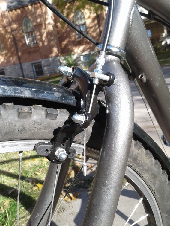 close up refinished bike brake caliper